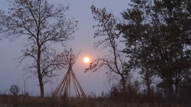 All the “How to photograph the supermoon” information we could find said to put something in front of the super moon for some perspective. So here’s a faux-abandoned tepee installed by Minnesota State Parks.
