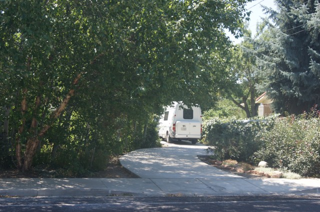Tree covered RV driveway Fit